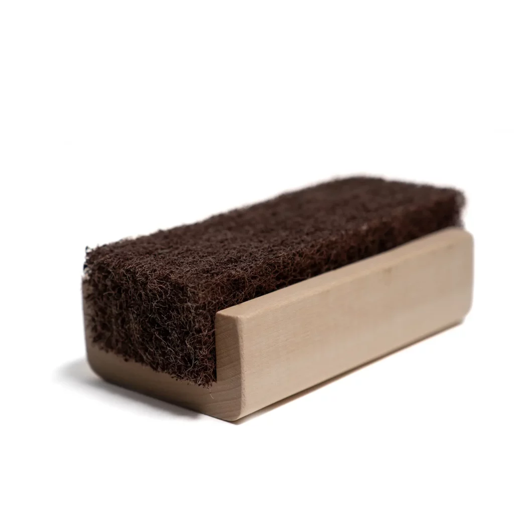 Sanding plane for removing climbing wax